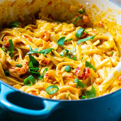 Crawfish fettuccine cajun ninja - Steps: 1. Cook the fettuccine as directed on the pkg. Drain and rinse well and set aside. 2. Saute the bell pepper, onions and celery in the butter until the onions start to look clear.
